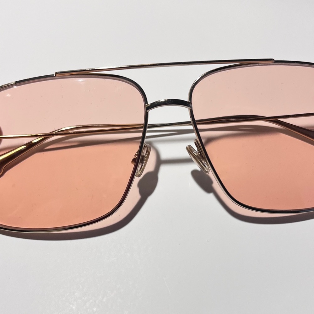 Dior pink sunglasses it’s too small for my face.